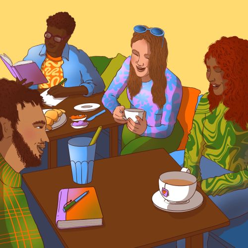 Four friends sitting around tables with drinks, reading and chatting