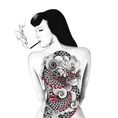 Woman smoking with intricate dragon tattoo across her back by Reiko Lauper