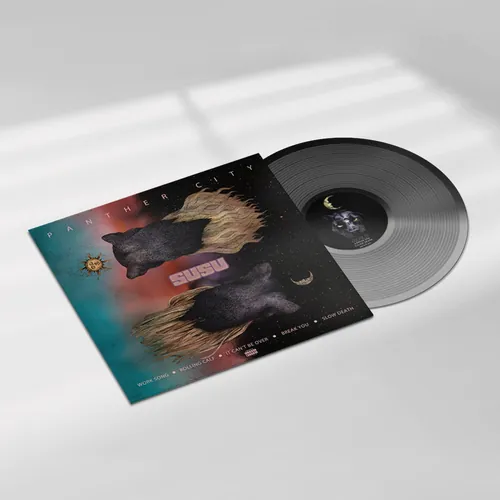 Vinyl record with album cover showing bears and flames artwork