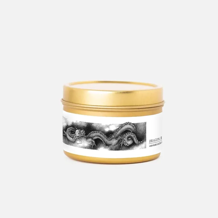 Gold jar with black-and-white octopus illustration on label by Reiko Lauper
