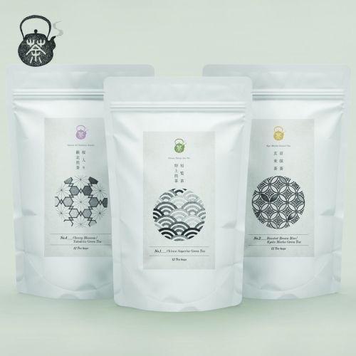 Three white tea pouches with Japanese patterns by Reiko Lauper