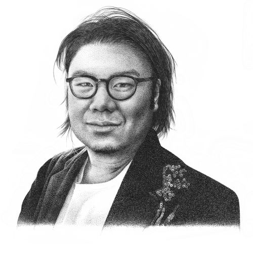 Monochrome portrait of a man wearing glasses and a jacket