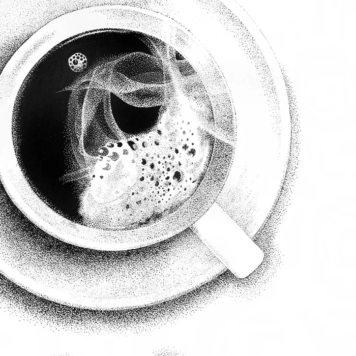 Top view of coffee cup with steam and bubbles in black and white