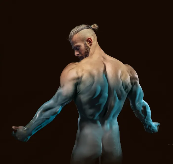 Muscular man posing sideways showing back muscles by RIVE GAUCHE
