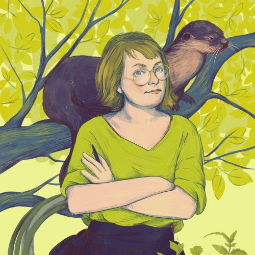 Woman standing with folded arms and otter on tree branch behind her