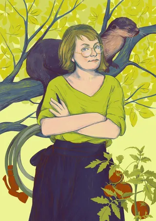 Woman standing with folded arms and otter on tree branch behind her