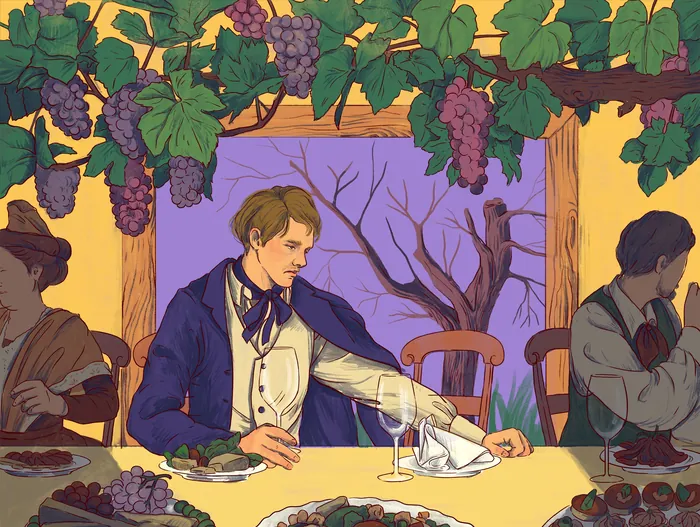 People sitting at a table outdoors under grapevine leaves and bunches of grapes