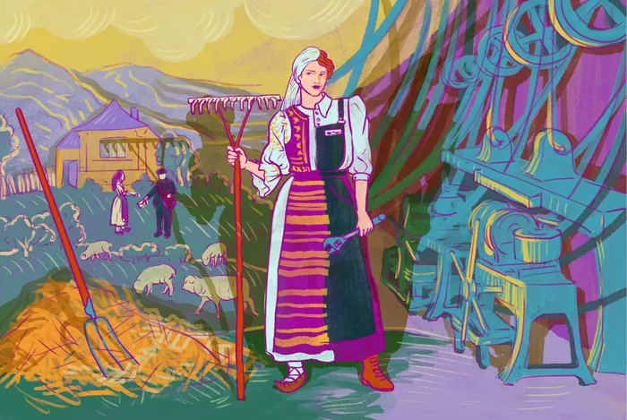 Woman in traditional clothes raking hay, sheep and mountains behind her.