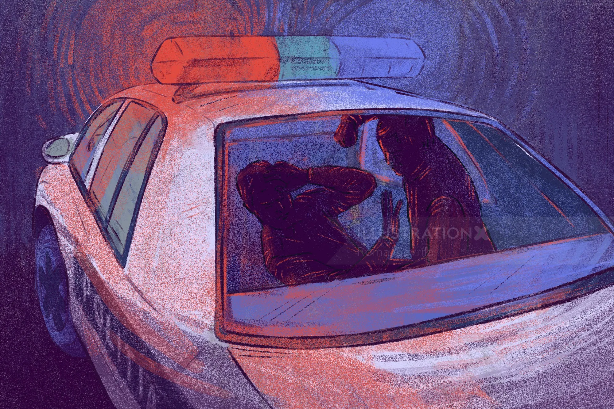 Person seated in rear of police car with flashing lights at night