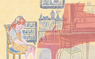 Girl sitting silently beside a grand piano in a cozy room