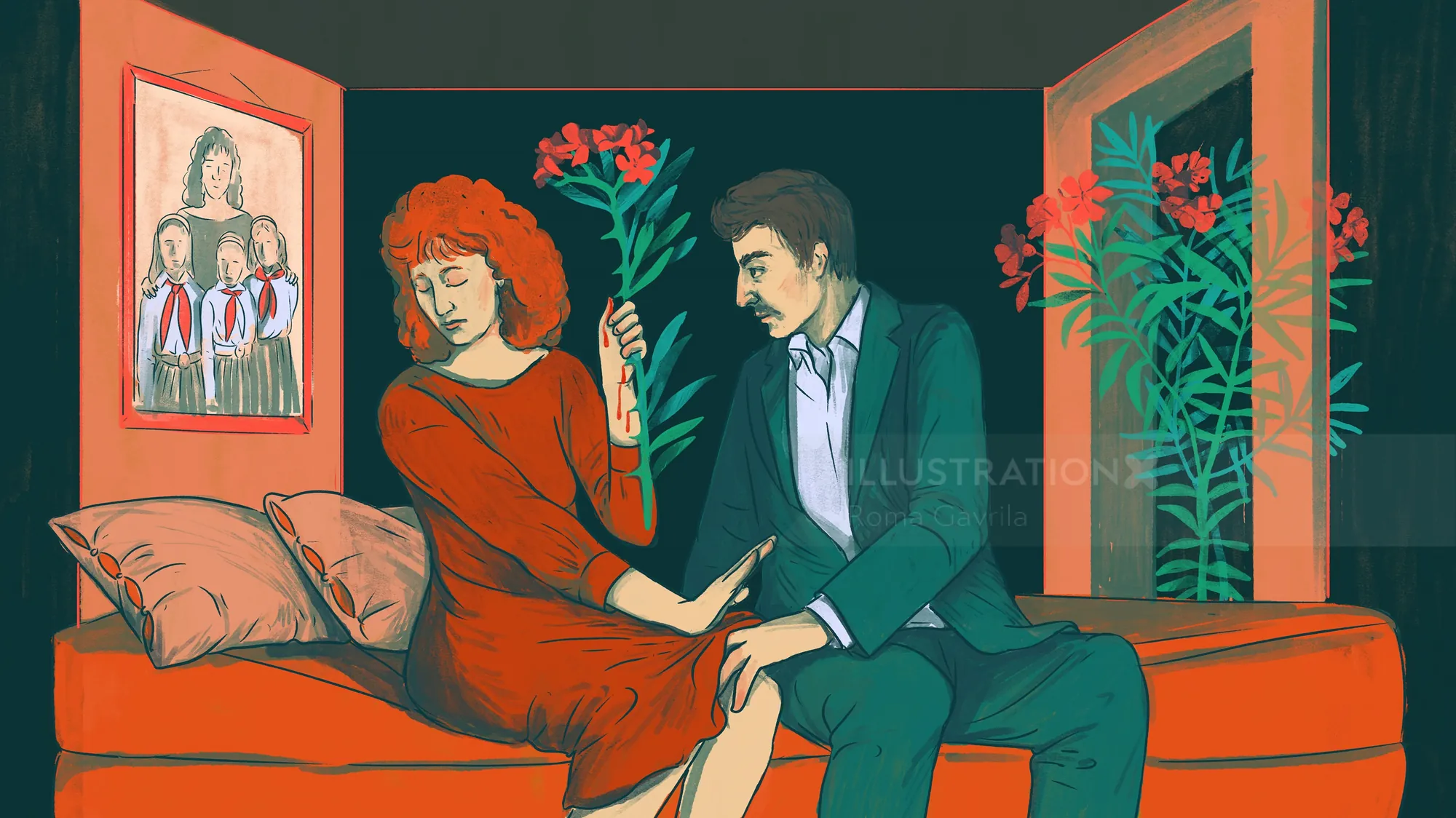 Couple sitting on a couch with the man giving flowers to the woman