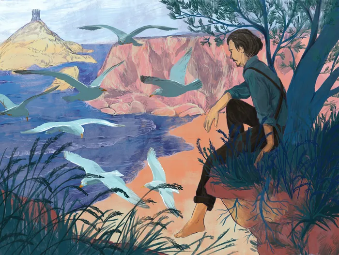 Person seated on cliff near sea with seagulls flying around at sunset