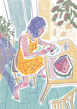Woman eating watermelon at table in a cozy room