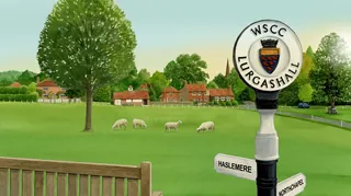 Haslemere village green with grazing sheep near signpost by Ruth Palmer