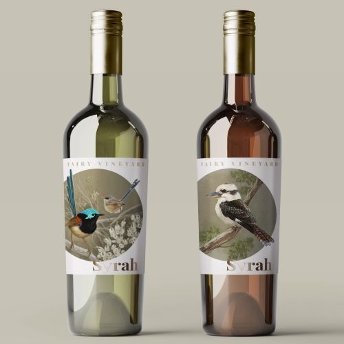 Two wine bottles with bird illustrations on labels