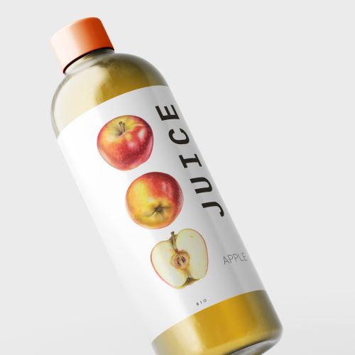 Bottle of apple juice with label showing apples and text