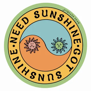 Sunshine themed circular magnet with smiling and frowning suns