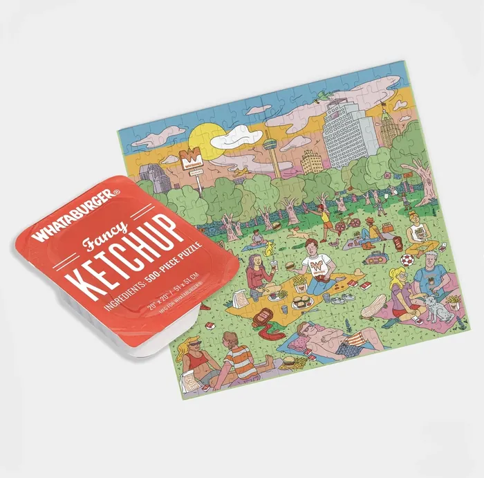 Colorful illustrated puzzle with park scene and Whataburger ketchup packet