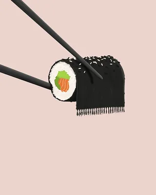 Sushi roll held by chopsticks against a pink background by Samy Löwe