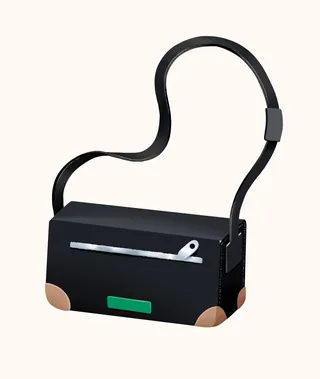 Black shoulder bag with zipper and brown corner details