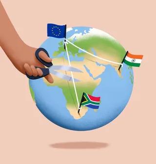 Hand cutting strings between European Union, India, and South Africa on globe