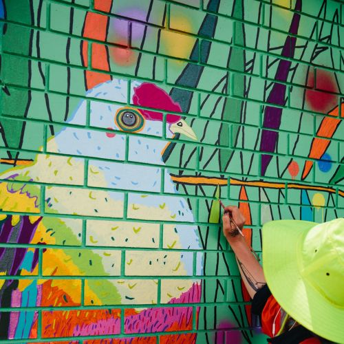 Hand painted bird wall mural