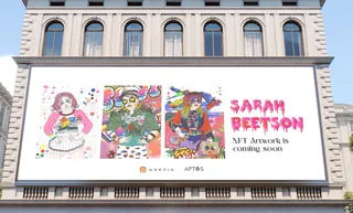 Billboard with vibrant pop art and text announcing Sarah Bretson's upcoming NFT artwork.