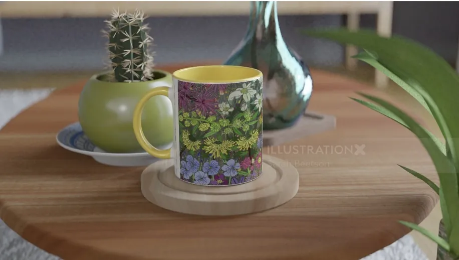 Floral mug on wooden table with plants in background by Sarah Beetson