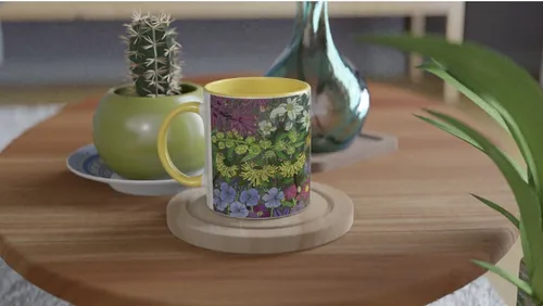 Floral mug on wooden table with plants in background by Sarah Beetson