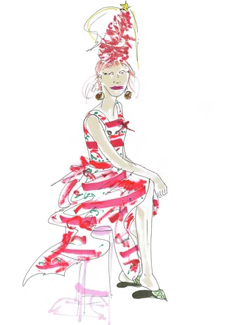 Woman wearing a Christmas tree hat and festive red dress