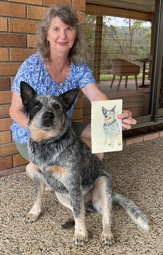 Woman with Australian cattle dog and a dog portrait