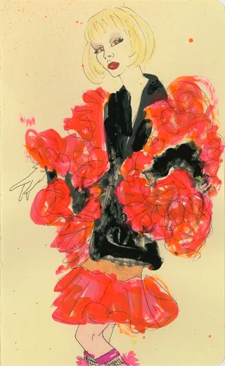 Stylish woman in black dress with red ruffled sleeves and skirt