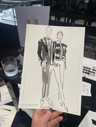 Black and white live fashion illustration of two Chanel customers