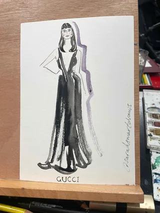 Watercolor fashion illustration of woman in long black Gucci dress