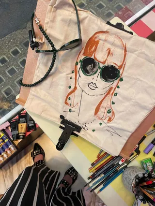 Canvas tote bag with live portrait illustration wearing black sunglasses