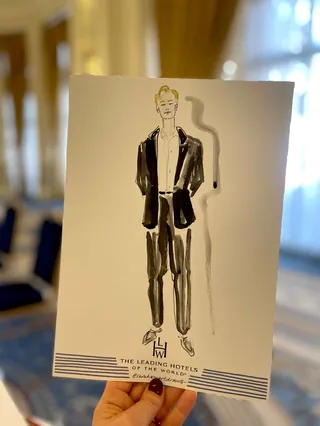 Fashion illustration of a man in suit at hotel event