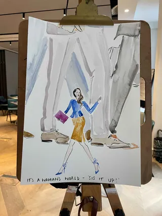 Fashion illustration of woman in blue jacket and yellow skirt