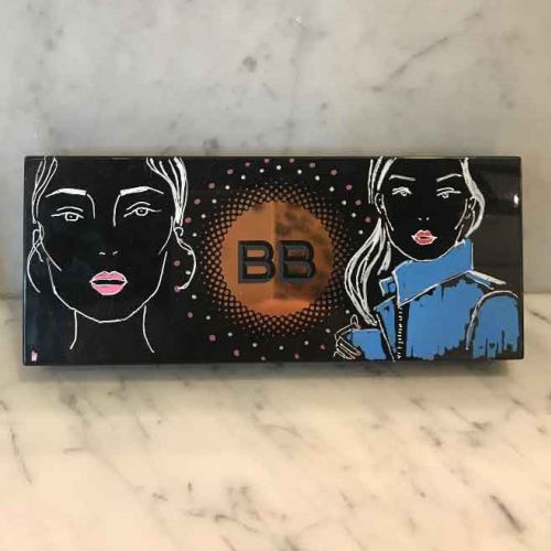 Bobbi Brown cosmetics palette with artistic face illustrations