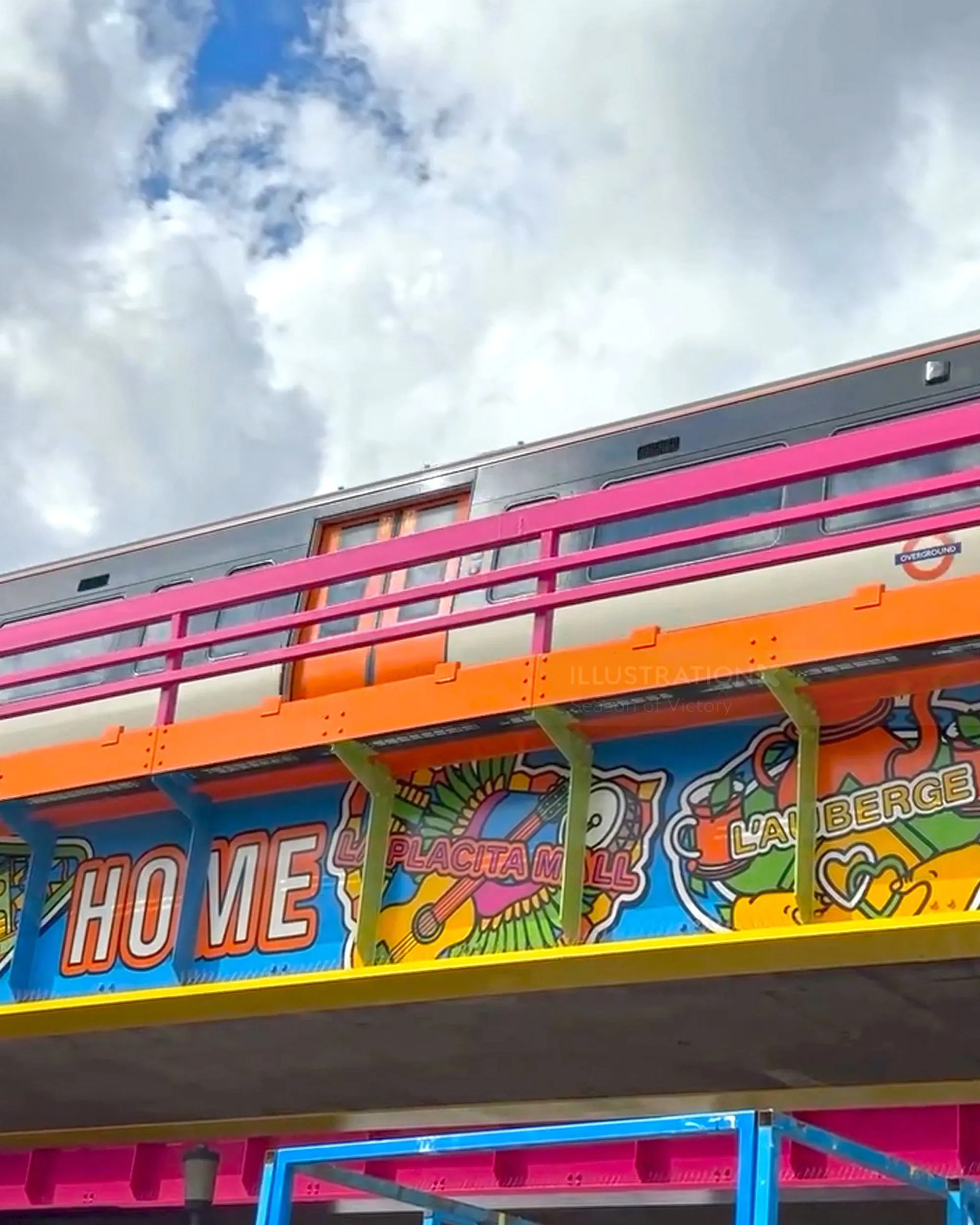 Colorful mural on Old Kent Road railway bridge with bright designs