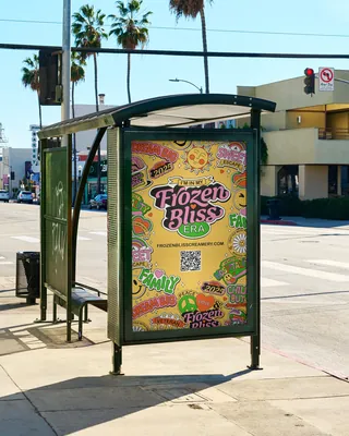 Colorful Frozen Bliss Creamery advertisement at a bus stop