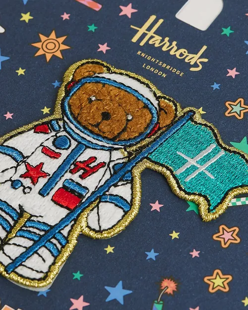 Patrón de superficie del oso astronauta de Harrods