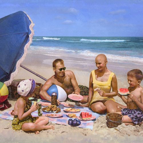 Happy family having food at beach