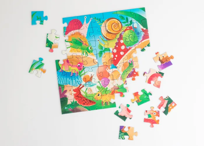 Partially completed children's puzzle with sea life and plants