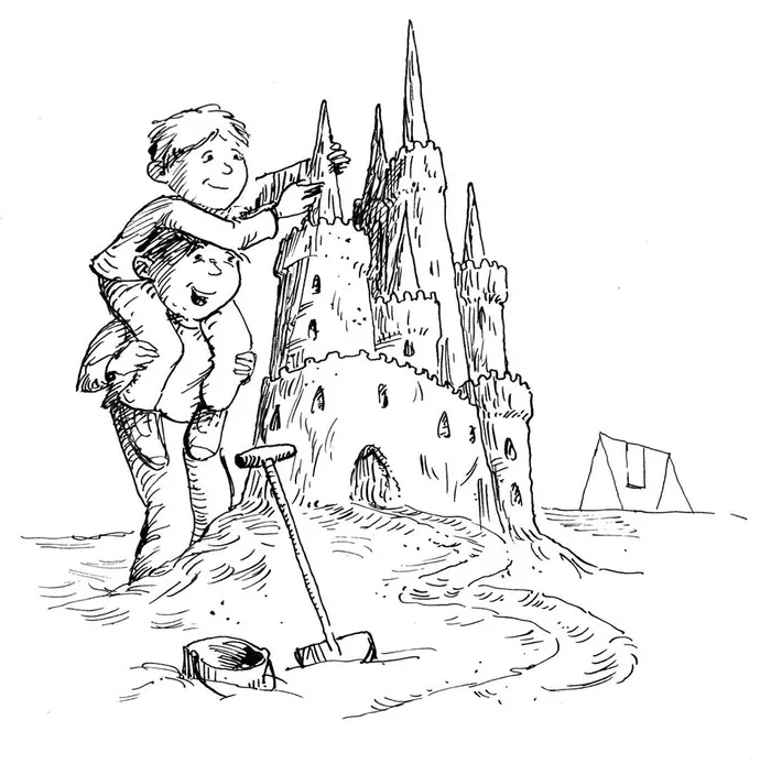Two boys building a large sandcastle on the beach