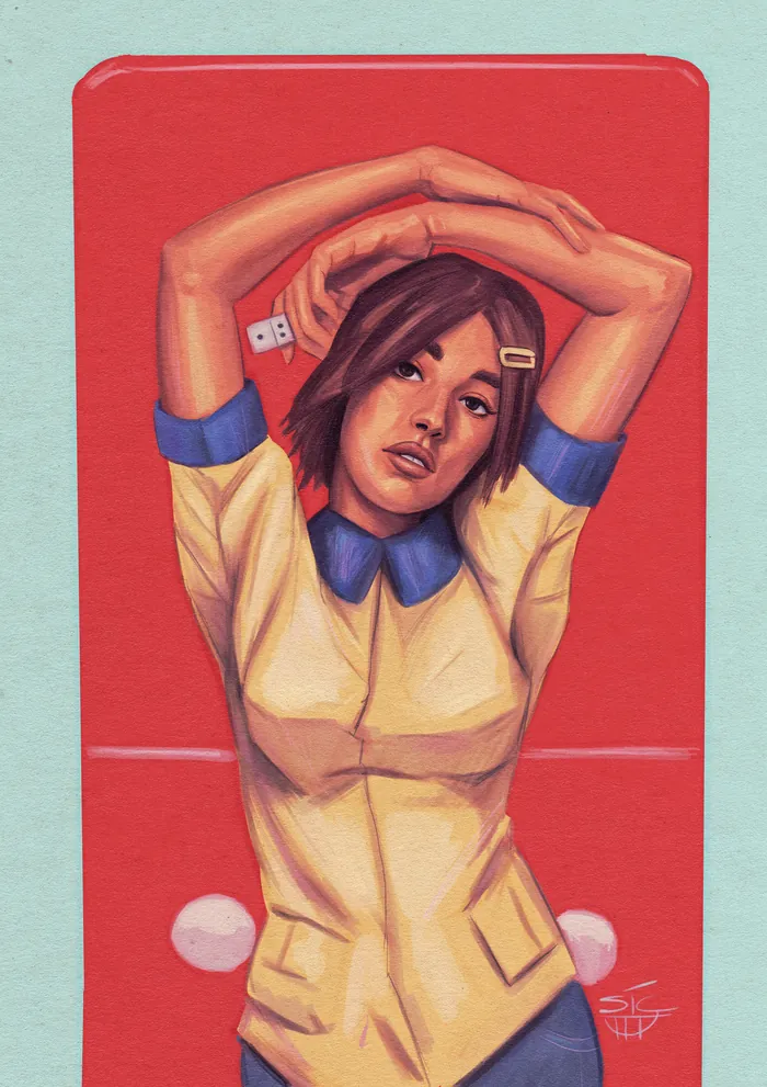 Woman in yellow dress with arms raised against red domino backdrop