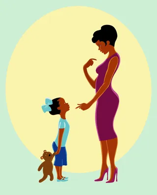 Mother and daughter having a conversation, child holding teddy bear