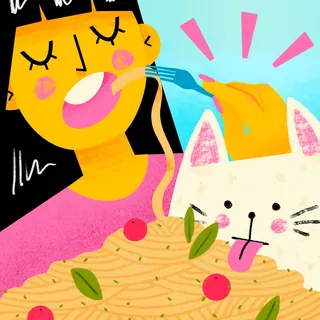 Girl and cat enjoying pasta together with happy expressions