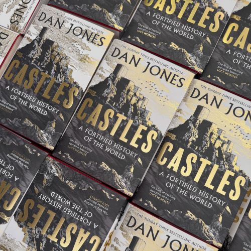 Studio Duco photograph of Castles book covers arranged in a pile