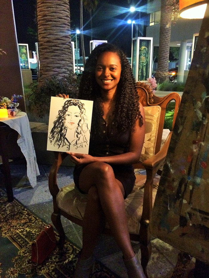Live Event Drawing girl showing her portrait