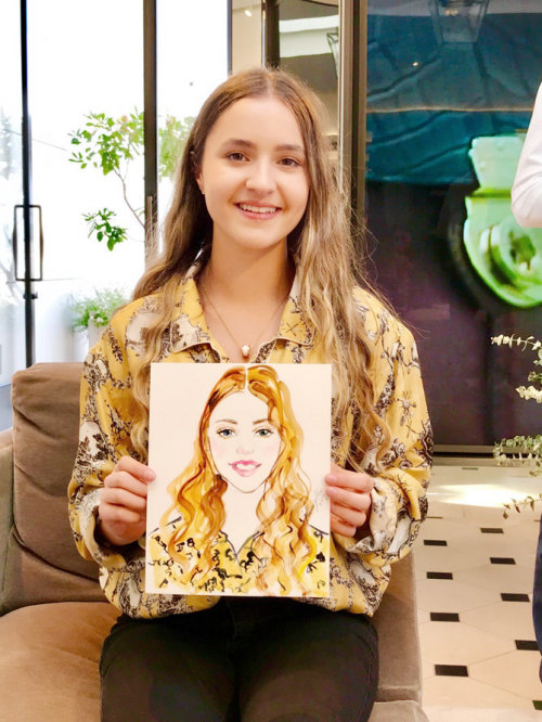 Live event drawing of girl with portrait
